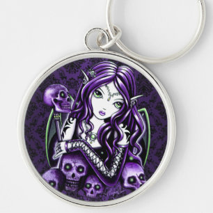 Chaveiro roxo da fada do crânio da "beladona"