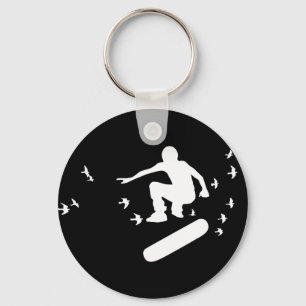 Chaveiro skateboard. prancha com pássaros.