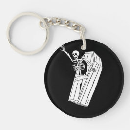 Chaveiro Skeleton saindo do caixão em um