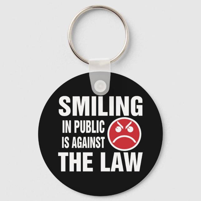 Chaveiro Sorrir em Público é Contra a Lei (Frente)