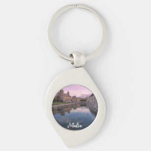 Chaveiro Sunset sobre pequeno canal em Cospicua, Malta