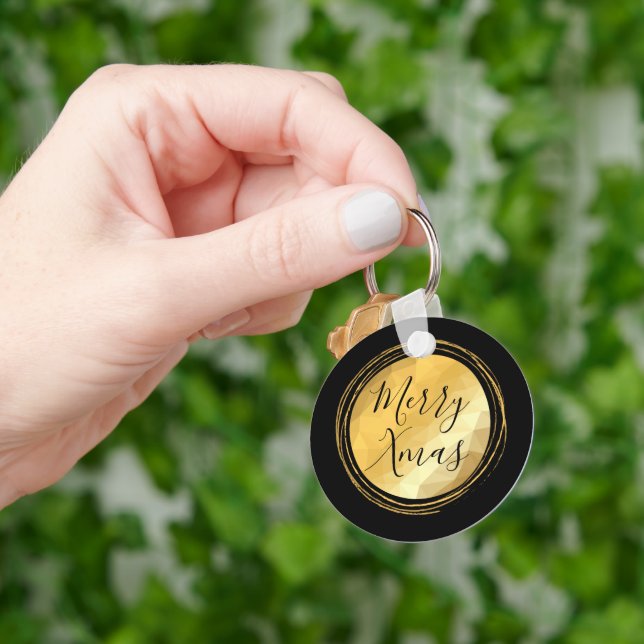 Chaveiro texto de Natal alegre metálico preto e dourado (Mão)