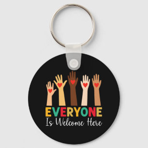 Chaveiro Todos São Bem-Vindo Aqui Idaho T-shirt.png