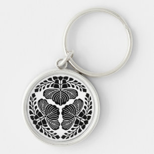 Chaveiro Três flores de paulownia, cabeças voltadas para fo