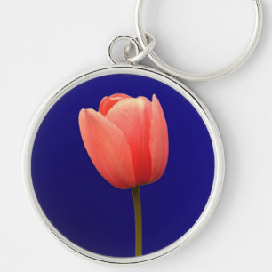 Chaveiro tulipa laranja de fundo azul