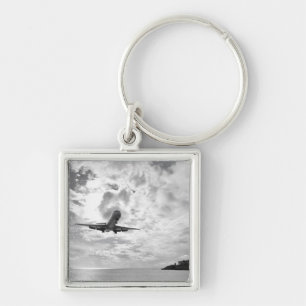 Chaveiro Um avião de passageiros entra para uma aterragem