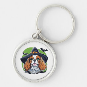 Chaveiro Um cachorro usando um chapéu de bruxa com morcegos