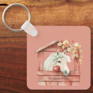 Chaveiro Um Cavalo Branco de Uma Maçã Por Dia