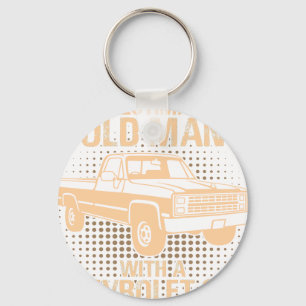 Chaveiro Um Chevrolet C10 Silverado 1987 de um homem velho
