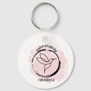 Chaveiro Um desenho de beija-flor para um logotipo em um ch