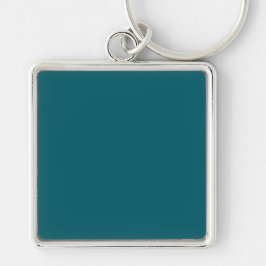 Chaveiro Um fundo azul-teal sólido preenche todo o