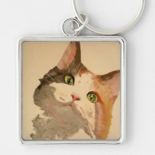 Chaveiro Um retrato artístico do gato calico de olhos verde