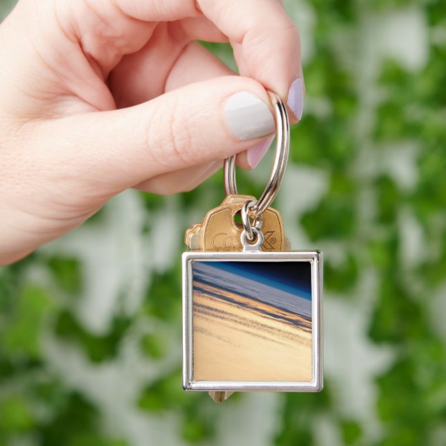 Chaveiro Um Sunset Orbital Ao Largo Da Costa Da Baixa Calif (Mão)