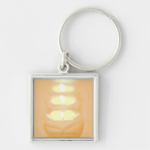 Chaveiro Uma fileira de velas iluminadas