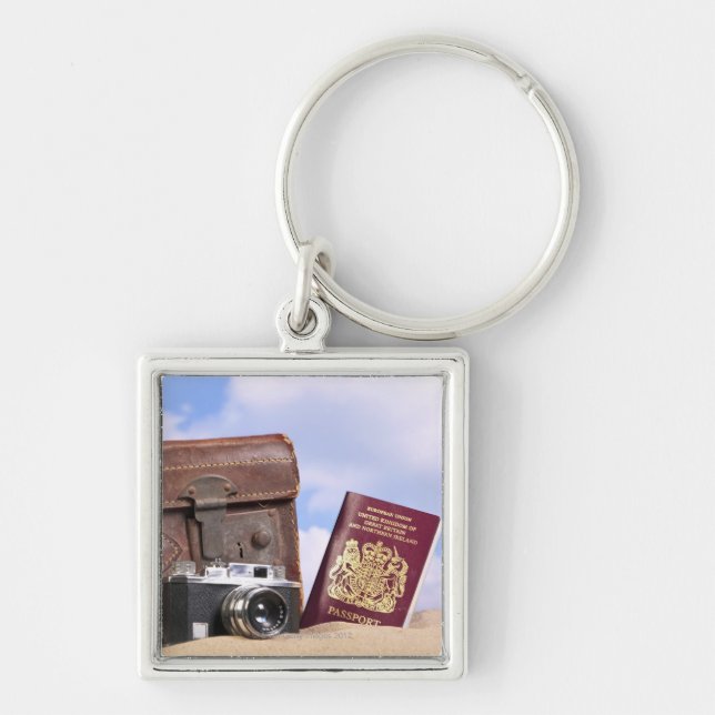 Chaveiro Uma mala de viagem de couro velha, uma câmera (Frente)
