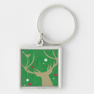 Chaveiro Uma silhueta de um cervo com as estrelas que