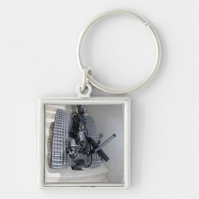 Chaveiro Uma unidade robótica Talon 3B subindo um voo de st (Frente)