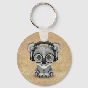 Chaveiro Urso de Koala bonito DJ do bebê que veste fones d