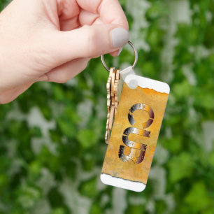 Chaveiro Urso de SlipperyJoe com palavras douradas castanha