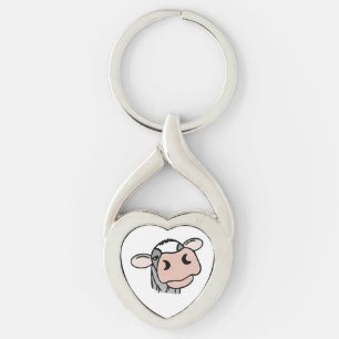 Chaveiro vaca de desenho animado preto branco rosa beijo ci