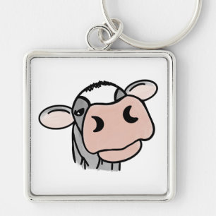 Chaveiro vaca de desenho animado preto branco rosa beijo ci
