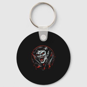Chaveiro Vampiro assustador mostrando dentes afiados pronto