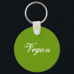 Chaveiro Vegan. Verde. Slogan. Personalizado<br><div class="desc">Em uma fonte de estilo de script agradável. Aqui diz: Vegan.</div>
