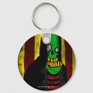Chaveiro verde de sorriso do zombi