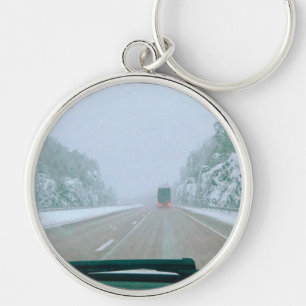Chaveiro Viagem de carro pela Suécia nevada