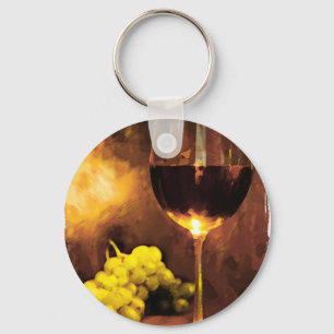 Chaveiro Vidro do vinho & de uvas verdes na luz de vela