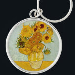 Chaveiro Vincent Van Gogh 12 Girassóis Impressionista<br><div class="desc">O vaso de Vincent Van Gogh com 12 girassóis é uma das famosas séries de girassóis de Van Gogh. Esta pintura de girassóis faz parte do segundo conjunto de belas pinturas impressionistas de girassóis de Van Gogh, que ele criou em 1888. Os girassóis são amarelos contra um fundo azul claro....</div>