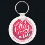 Chaveiro Vinho Ria Muito<br><div class="desc">O chaveiro de botão redondo apresenta texto divertido "Wine a Little Laugh A Lot" em uma mancha de vinho tinto - personalize com sua informação de partido. Chaveiros fazem presentes memoráveis para familiares e amigos ou criam por si mesmos.</div>