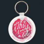Chaveiro Vinho Ria Muito<br><div class="desc">O chaveiro de botão redondo apresenta texto divertido "Wine a Little Laugh A Lot" em uma mancha de vinho tinto - personalize com sua informação de partido. Chaveiros fazem presentes memoráveis para familiares e amigos ou criam por si mesmos.</div>