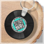 Chaveiro Vinil | Musical DJ | Código QR<br><div class="desc">Apresentando nosso chaveiro de código QR do estilo VL personalizável - o acessório perfeito para o profissional de música! Este chaveiro apresenta um elegante registro de LP de vinilo em azul-aqua e cinzas, juntamente com um código QR que pode ser ligado à sua própria música. Com nosso recurso de "personalização",...</div>