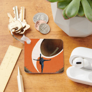 Chaveiro Vintage Sports, jogador de futebol batendo a bola