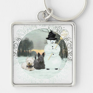 Chaveiro Westie e Scottie Constroem um Boneco de Neve