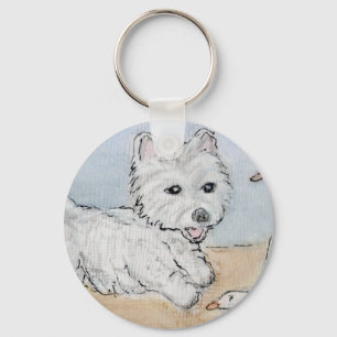 CHAVEIRO WESTIE QUE JOGA NA PRAIA