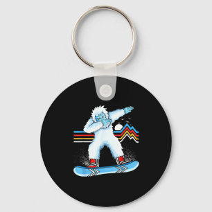 Chaveiro Yeti fazendo dab snowboarding montanha vintage