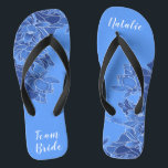 Chinelos Equipe Personalizada Favorita Blue Lotus Floral<br><div class="desc">Apresentando uma ilustração elaborada do padrão floral do Lotus azul, estes chinelos elegantes e antigos são um presente memorável para membros festas de casamento: noiva, damas de honra, mãe/tia da noiva, madrinha de casamento... Eles adicionarão uma dose de na moda de brilho ao seu dia de casamento, festa de solteira...</div>
