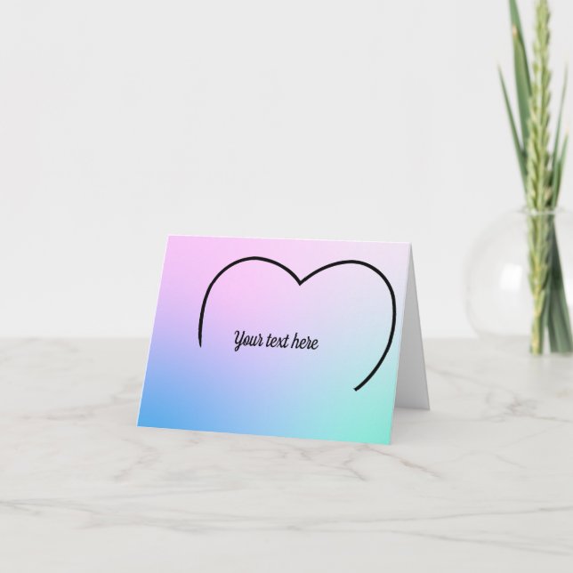 Cima de um coração num cartão de nota pastel (Frente)