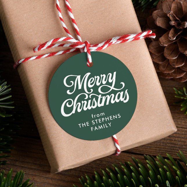 Clássica de Natal feliz com a etiqueta de presente (Criador carregado)