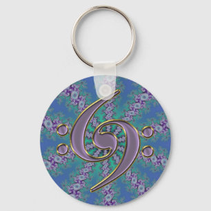 Clef de contrabaixo da música no chaveiro azul do