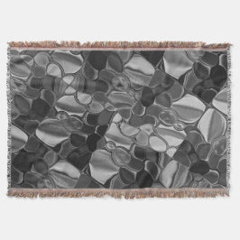 Cobertor Cinzas claras e formas arredondadas escuras.