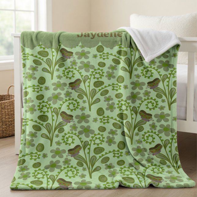 Cobertor De Velo Borboletas Fofas e Plantas Tons de Verde (Butterflies, leafy swirls, and your name on top. This blanket is all about cozy fun.)