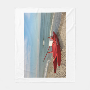 Cobertor De Velo Pattino rosso sulla spiaggia - fotografia de mar