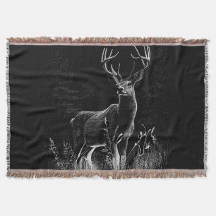 Cobertor Deer with antlers framed by field and tree