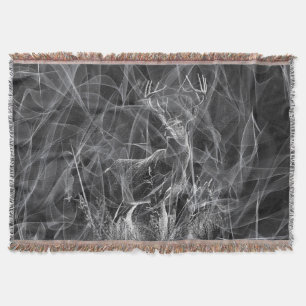 Cobertor Deer with antlers framed by field and tree