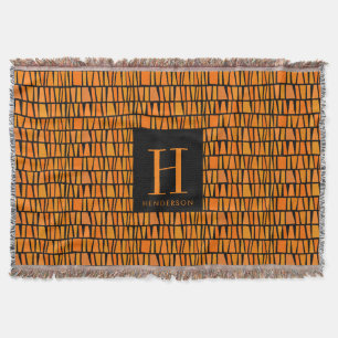 Cobertor Monograma de padrão laranja inspirado em africano