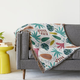 Cobertor padrão tropical com folhas coloridas