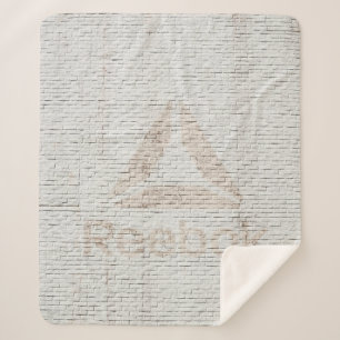 Cobertor Sherpa Foto de aproximação do logotipo Reebok na parede